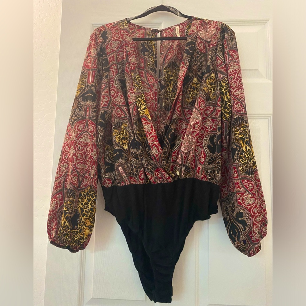 NWOT 🖤💛❤️🤍VERY SEXY BODYSUIT